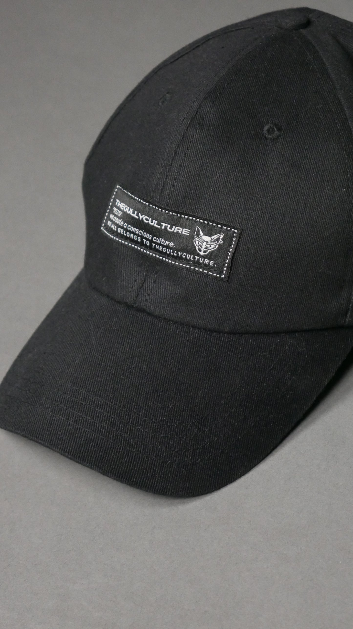 WE CREATE A CONSCIOUS CULTURE BASEBAL CAP ( BLACK)