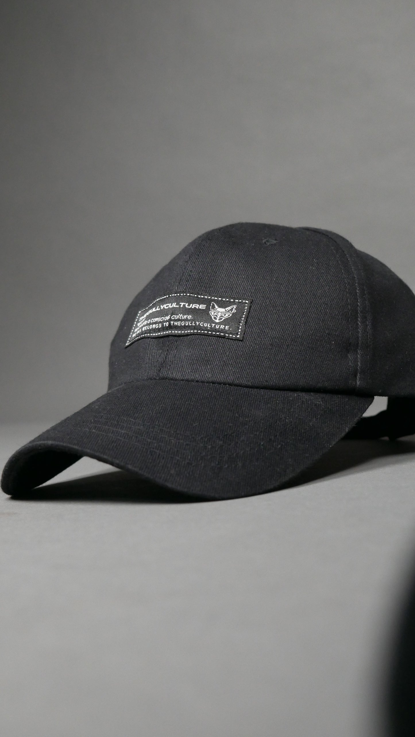 WE CREATE A CONSCIOUS CULTURE BASEBAL CAP ( BLACK)